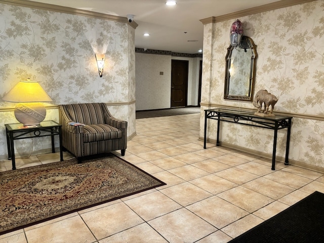 community lobby with crown molding, wallpapered walls, recessed lighting, and a surveillance system