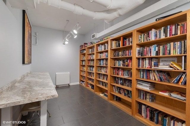living area with bookshelves