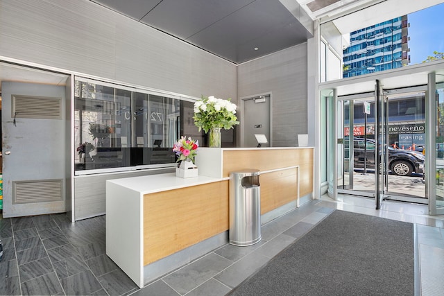 reception area with a towering ceiling