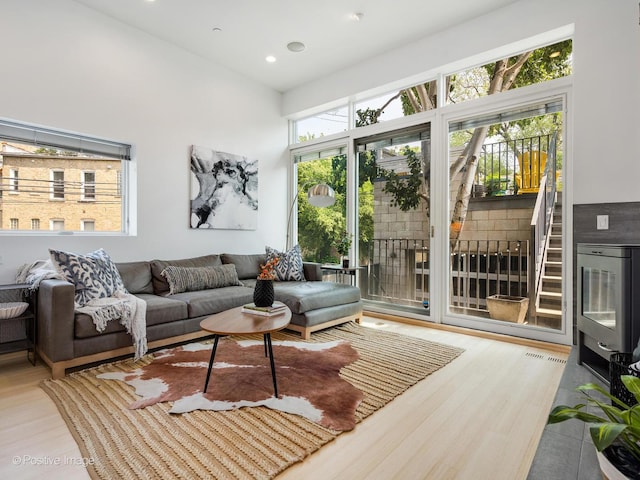 1729 W Potomac Ave, Chicago, IL 60622 - living room featuring wood finished floors, a high ceiling, and recessed lighting