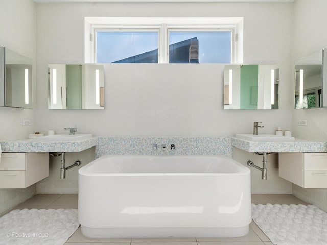 1729 W Potomac Ave, Chicago, IL 60622 - bathroom with tile patterned floors, a bath, and two sinks