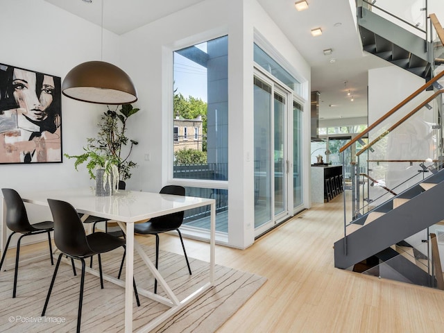 1729 W Potomac Ave, Chicago, IL 60622 - dining room featuring stairway and wood finished floors