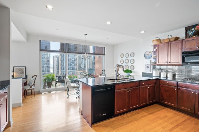 445 E N Water St Unit 2105, Chicago, IL 60610 - kitchen featuring black appliances, light wood finished floors, open shelves, and recessed lighting