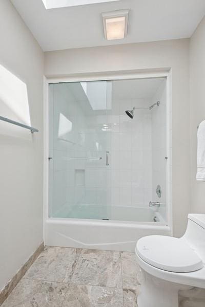 3726 Pebble Beach Rd, Northbrook, IL 60062 - full bath with toilet, shower / bath combination with glass door, and baseboards