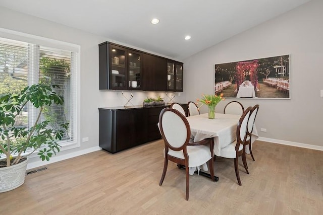 3726 Pebble Beach Rd, Northbrook, IL 60062 - dining area featuring lofted ceiling, baseboards, light wood-style flooring, and recessed lighting