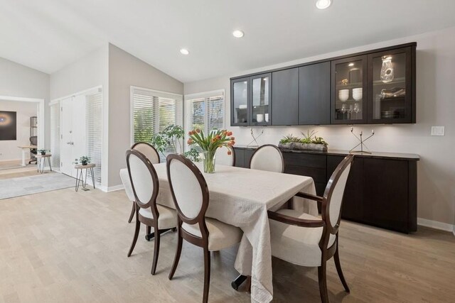 3726 Pebble Beach Rd, Northbrook, IL 60062 - dining space with vaulted ceiling, baseboards, recessed lighting, and light wood-type flooring