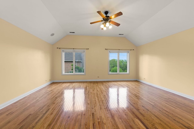 1161 Gavin Ct, Lake Forest, IL 60045 - spare room with lofted ceiling, light wood finished floors, ceiling fan, and baseboards