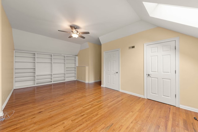 1161 Gavin Ct, Lake Forest, IL 60045 - bonus room with vaulted ceiling, light wood-style floors, a skylight, a ceiling fan, and baseboards