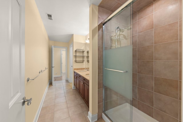 1161 Gavin Ct, Lake Forest, IL 60045 - full bathroom with tile patterned floors, double vanity, a stall shower, and baseboards