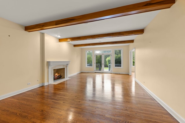 1161 Gavin Ct, Lake Forest, IL 60045 - unfurnished living room featuring a fireplace with flush hearth, wood finished floors, beamed ceiling, and baseboards