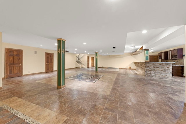 1161 Gavin Ct, Lake Forest, IL 60045 - finished basement with stairway, recessed lighting, baseboards, and stone finish flooring