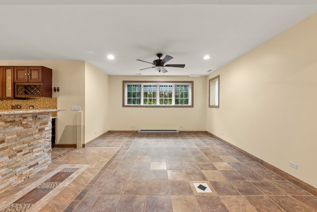 1161 Gavin Ct, Lake Forest, IL 60045 - empty room featuring baseboard heating, ceiling fan, baseboards, recessed lighting, and bar