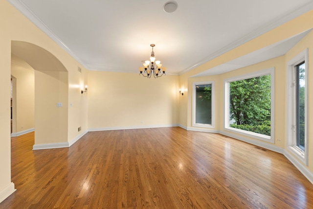 1161 Gavin Ct, Lake Forest, IL 60045 - spare room featuring crown molding, a chandelier, wood finished floors, and baseboards