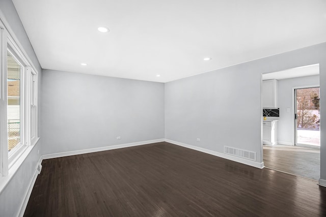 16779 92nd Ave, Orland Hills, IL 60487 - empty room featuring dark wood-type flooring, baseboards, and recessed lighting