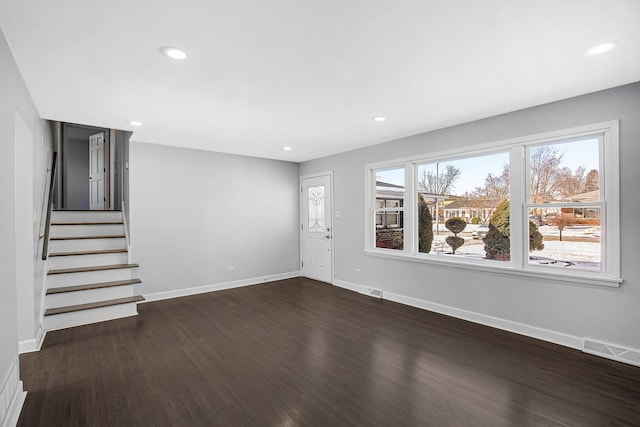 16779 92nd Ave, Orland Hills, IL 60487 - unfurnished living room featuring dark wood finished floors, baseboards, stairway, and recessed lighting