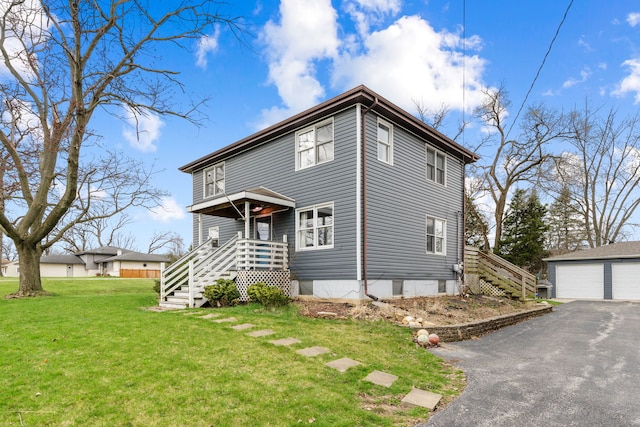 16040 Lockwood Ave, Oak Forest, IL 60452 - american foursquare style home featuring an outdoor structure, a front lawn, stairway, and a detached garage