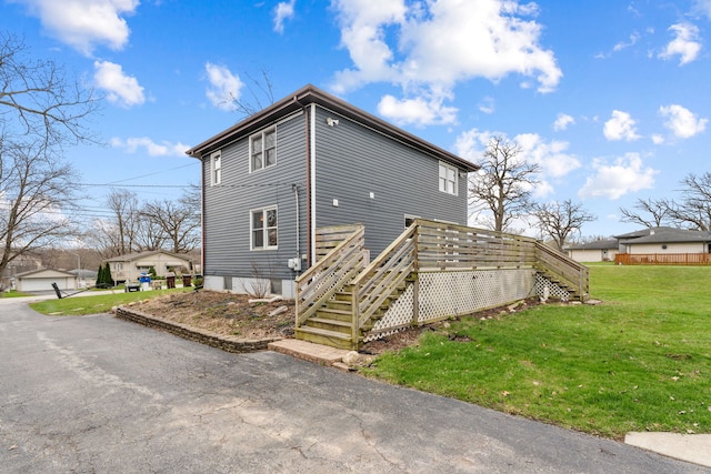 16040 Lockwood Ave, Oak Forest, IL 60452 - rear view of house featuring stairway, a lawn, and a deck