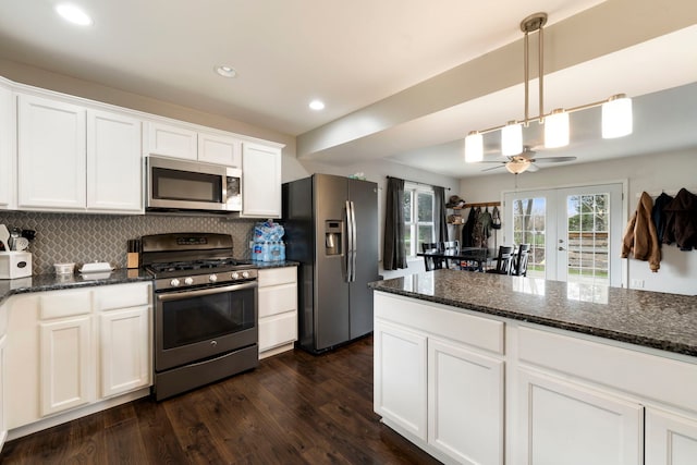 16040 Lockwood Ave, Oak Forest, IL 60452 - kitchen with appliances with stainless steel finishes, white cabinetry, backsplash, dark wood finished floors, and recessed lighting