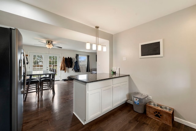 16040 Lockwood Ave, Oak Forest, IL 60452 - kitchen with stainless steel refrigerator with ice dispenser, a peninsula, white cabinetry, dark stone counters, and dark wood finished floors