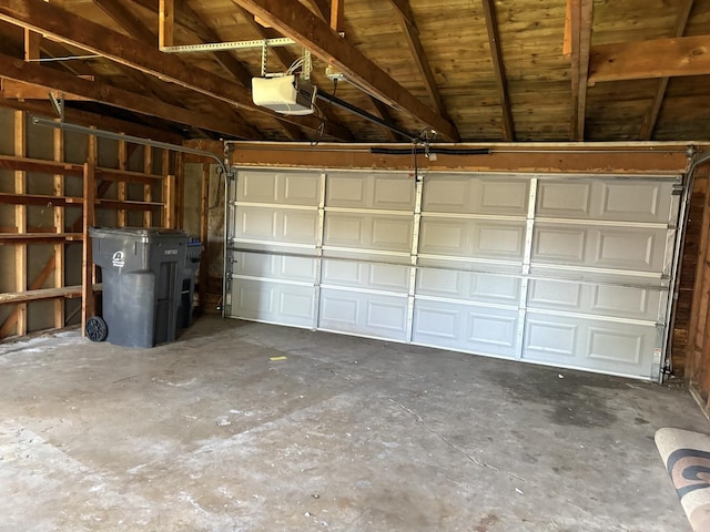 garage featuring a garage door opener