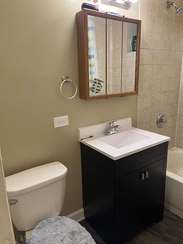 3118 W Douglas Blvd, Chicago, IL 60623 - bathroom featuring vanity, toilet, and bathtub / shower combination