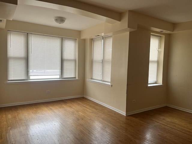 3118 W Douglas Blvd, Chicago, IL 60623 - spare room featuring hardwood / wood-style floors and baseboards