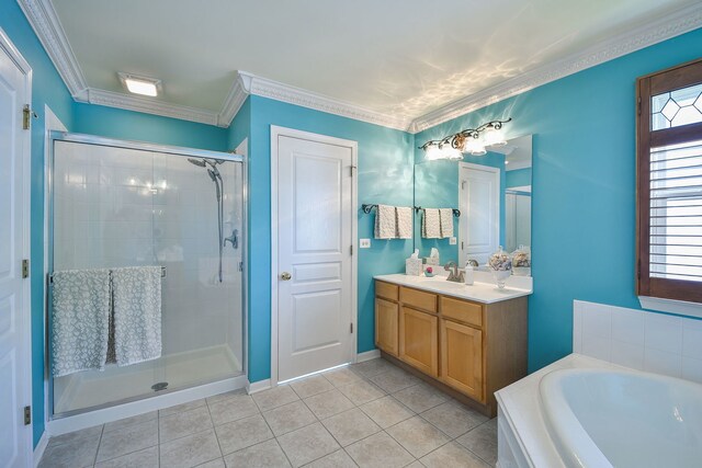 24706 Apollo Dr, Plainfield, IL 60585 - bathroom with a stall shower, tile patterned flooring, vanity, a garden tub, and crown molding