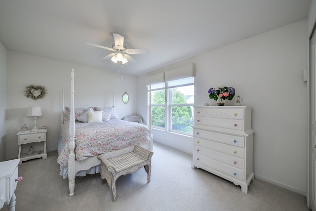 24706 Apollo Dr, Plainfield, IL 60585 - bedroom featuring light colored carpet, a ceiling fan, and baseboards
