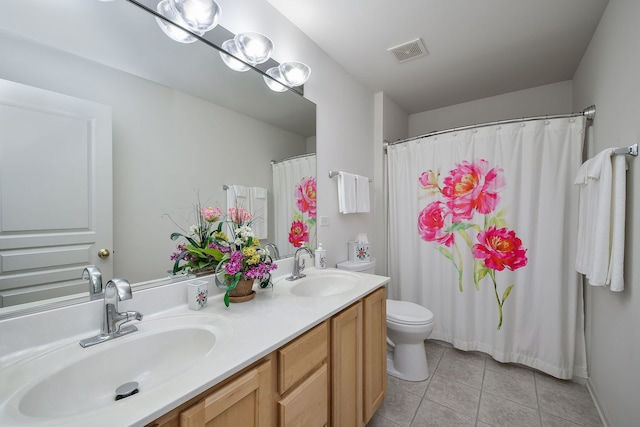 24706 Apollo Dr, Plainfield, IL 60585 - full bath with tile patterned floors, double vanity, and toilet