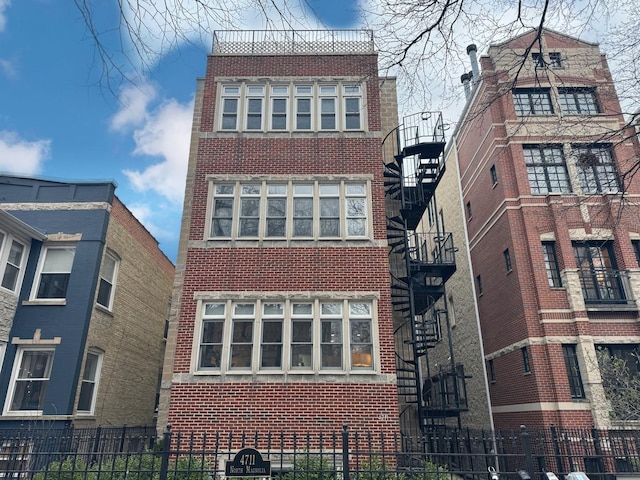 view of property featuring stairway