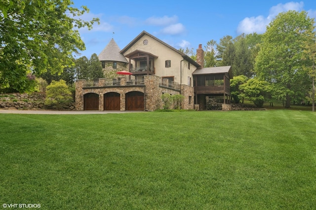 236 Steeplechase Rd, Barrington Hills, IL 60010 - view of front facade featuring stone siding, a balcony, a garage, and a front yard