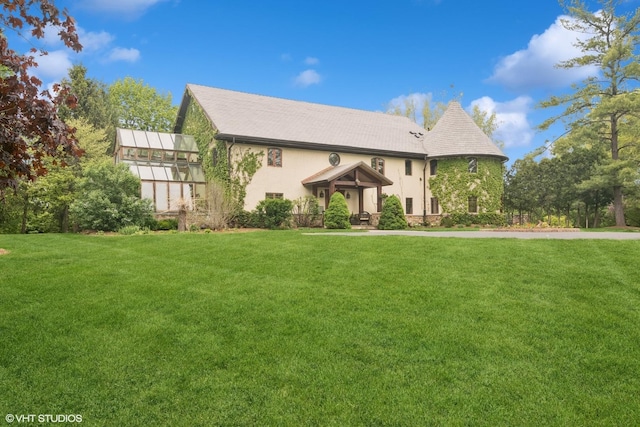 236 Steeplechase Rd, Barrington Hills, IL 60010 - view of front of house with a front yard, stucco siding, and stone siding