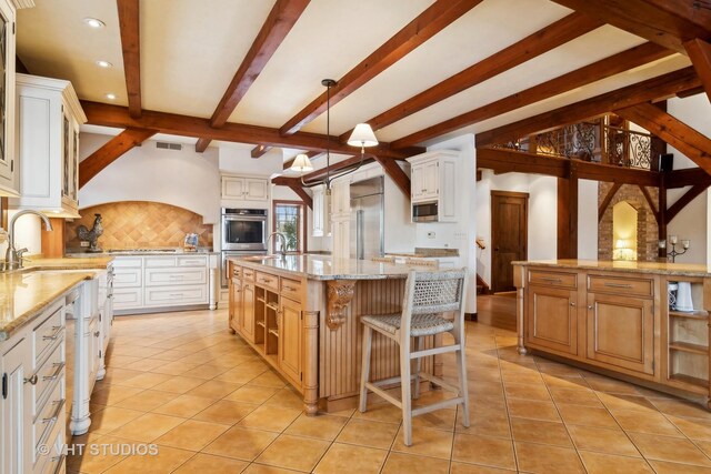 236 Steeplechase Rd, Barrington Hills, IL 60010 - kitchen featuring a large island, appliances with stainless steel finishes, tasteful backsplash, beam ceiling, and recessed lighting