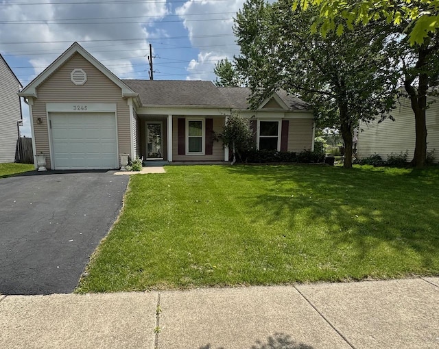 3245 Bremerton Ln, Aurora, IL 60504 - ranch-style home featuring an attached garage, asphalt driveway, a front yard, and roof with shingles