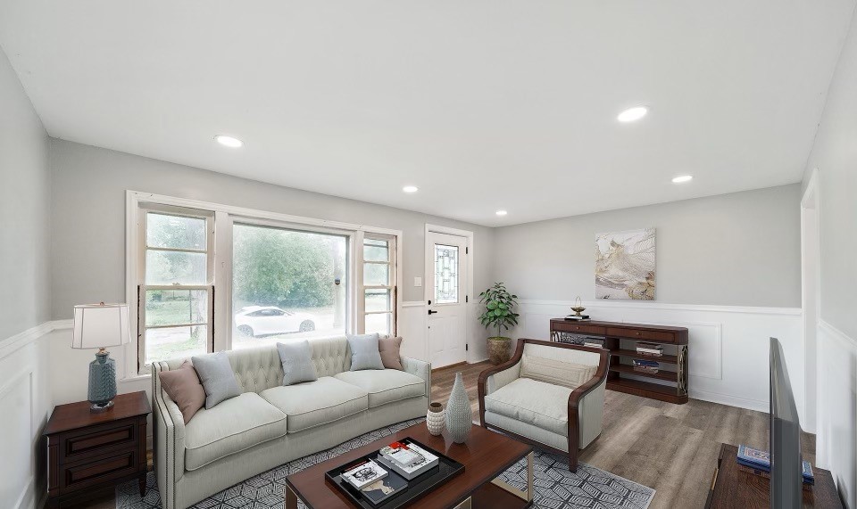 14808 Leavitt Ave, Harvey, IL 60426 - living room featuring wainscoting, wood finished floors, a decorative wall, and recessed lighting