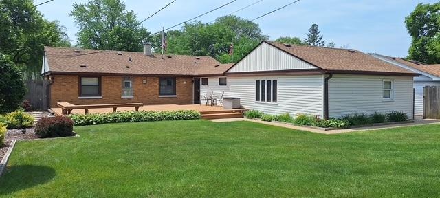 4904 Spring Rd, Oak Lawn, IL 60453 - rear view of property with a yard and a deck