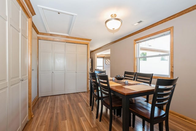 4904 Spring Rd, Oak Lawn, IL 60453 - dining room featuring wood finished floors and crown molding