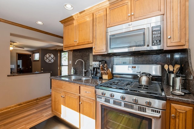 4904 Spring Rd, Oak Lawn, IL 60453 - kitchen featuring stainless steel appliances, tasteful backsplash, crown molding, recessed lighting, and wood finished floors