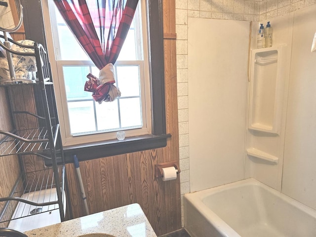 full bathroom with vanity and  shower combination