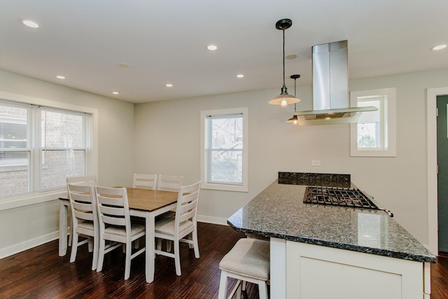 5236 N Mobile Ave, Chicago, IL 60630 - dining area featuring dark wood-style floors, baseboards, healthy amount of natural light, and recessed lighting