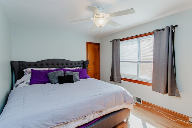5236 N Mobile Ave, Chicago, IL 60630 - bedroom featuring wood finished floors and ceiling fan