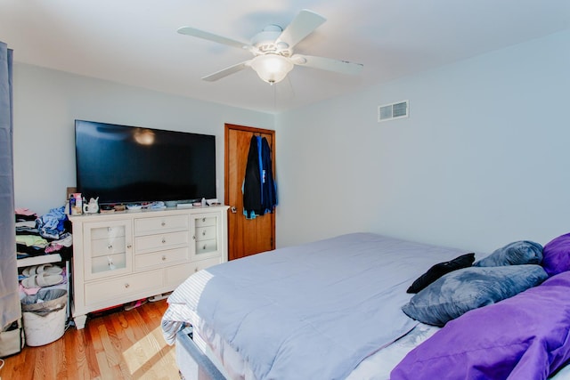 5236 N Mobile Ave, Chicago, IL 60630 - bedroom with wood finished floors and ceiling fan