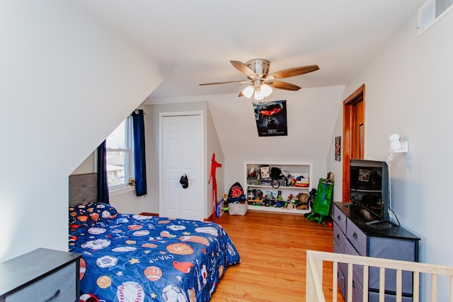 5236 N Mobile Ave, Chicago, IL 60630 - bedroom with wood finished floors and ceiling fan