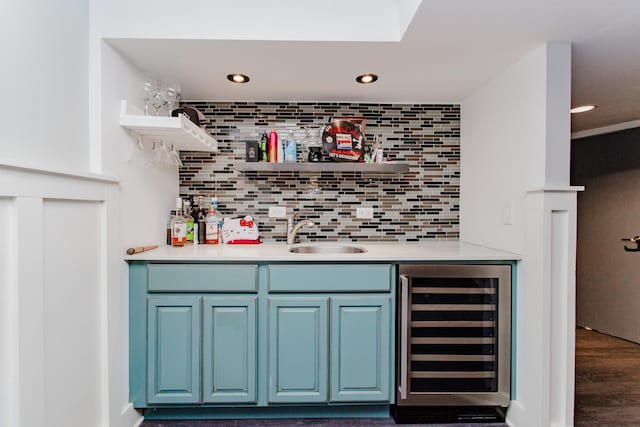 5236 N Mobile Ave, Chicago, IL 60630 - indoor wet bar featuring beverage cooler, decorative backsplash, recessed lighting, and wood finished floors