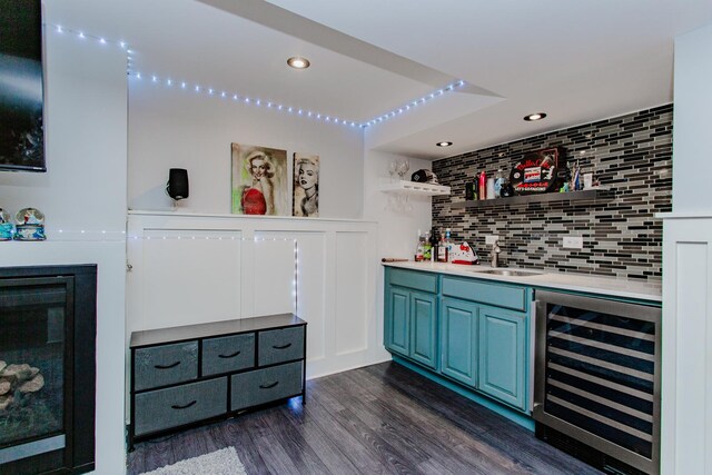 5236 N Mobile Ave, Chicago, IL 60630 - indoor wet bar with wine cooler, tasteful backsplash, dark wood-style floors, and recessed lighting