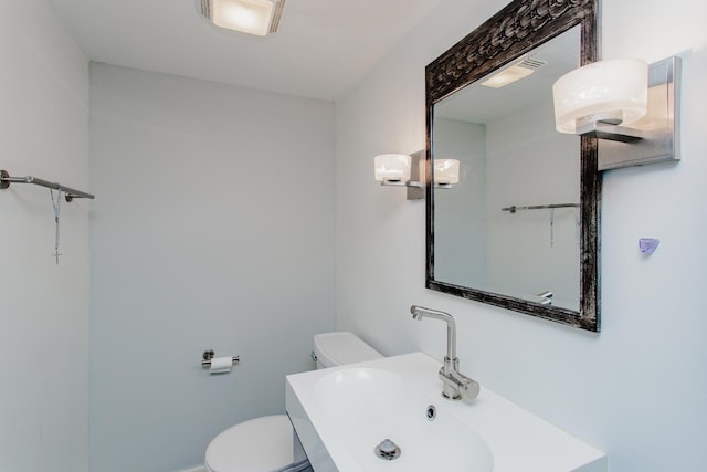 5236 N Mobile Ave, Chicago, IL 60630 - half bath featuring a sink and toilet