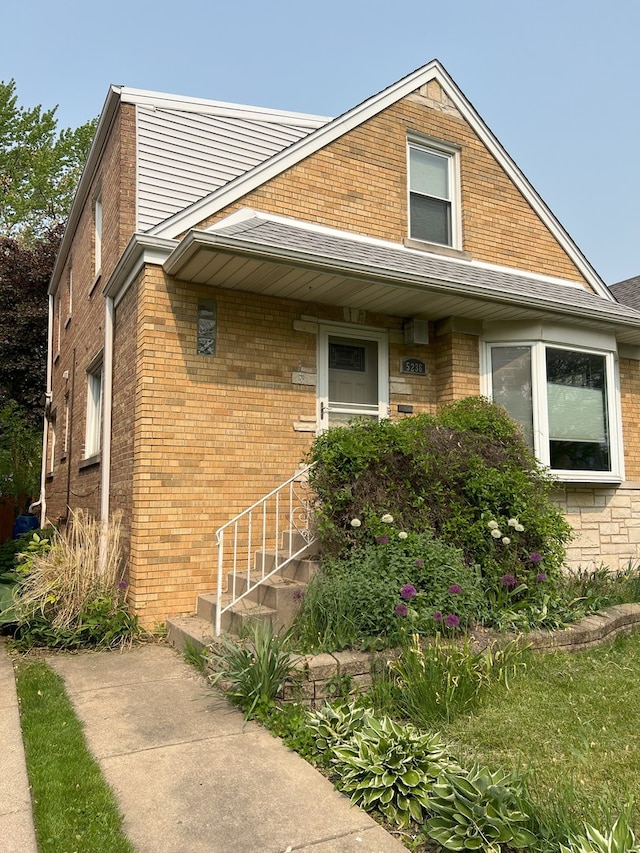 5236 N Mobile Ave, Chicago, IL 60630 - view of front of house with brick siding