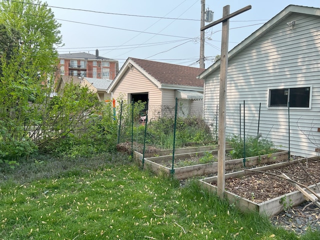 5236 N Mobile Ave, Chicago, IL 60630 - view of yard featuring a vegetable garden