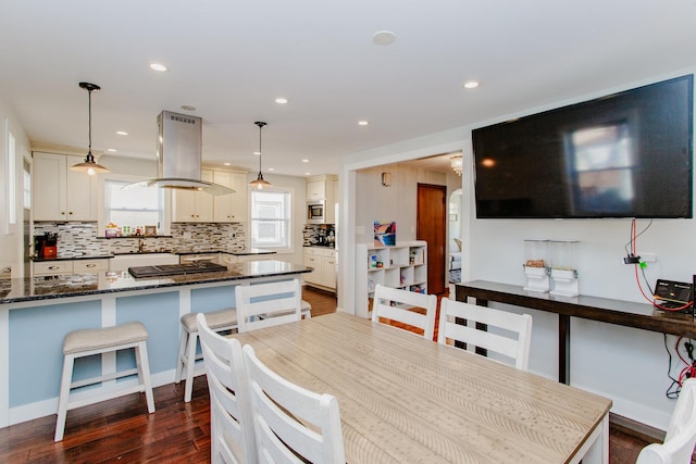 5236 N Mobile Ave, Chicago, IL 60630 - dining space with dark wood-style flooring and recessed lighting