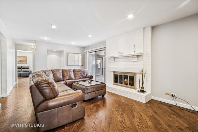 210 Constance Ln, Northbrook, IL 60062 - living area with baseboards, wood finished floors, a fireplace, and recessed lighting